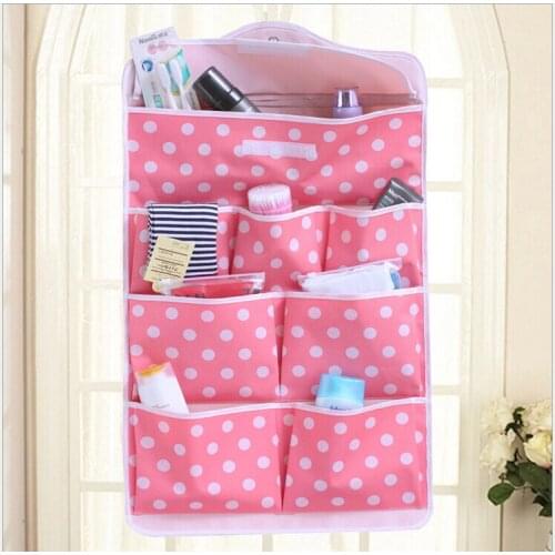 Fedex free shipping 100 PCS Portable Home Storage Bag 8 Pocket Wall Hanging Bags Multi-layer Fabric Debris Bags