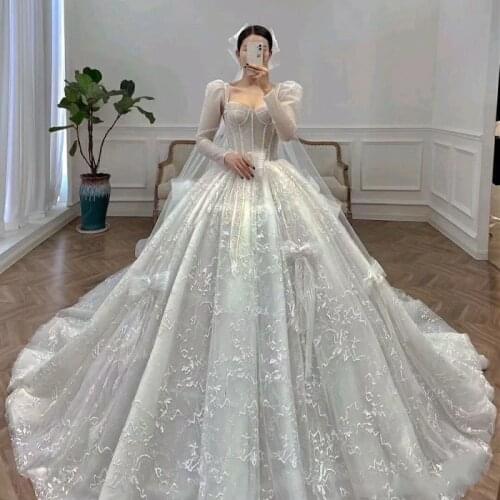 Sparkling Beaded Wedding Dress For Bridal Sexy V Neck Sleeveless Glitter Long Train Bridal Gowns Plus Size Dubai Ball Gowns