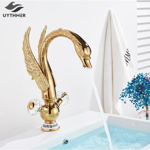 Luxury Gold Swan Basin Faucet Deck Mounted Bathroom Faucet Hot and Cold Water Mixer Tap Bath Water Faucet Basin sink taps