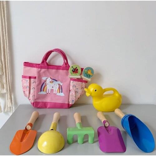 Children dig sand shovels Nine sets of beach toys Play with sand outdoor tools Handbag set