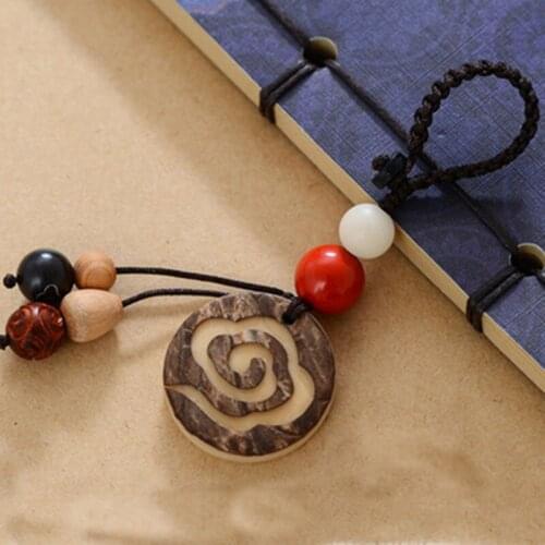 Creative personality keychain ivory fruit auspicious cloud red sandalwood car key buckle bag ornaments mobile phone lanyard