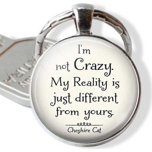 Hot sale Alice In Wonderland Cheshire Cat Funny Glass Cabochon Keychain Keyring Keychain Creative Gift