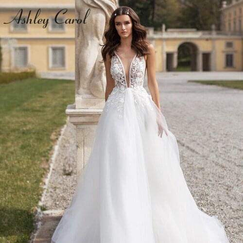 Ashley Carol A-Line Wedding Dress 2021 Elegant Backless Boho V-Neck Beaded Flowers Sleeveless Beach Bridal Gown Vestido De Noiva