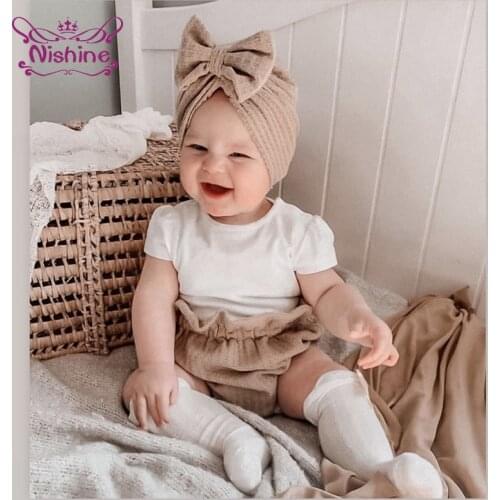 18*17 CM Infant Comfortable Warm Knitting Hats Solid Color Handmade Bowknot Baby Girls Caps Cute Bows Headwear Birthday Gifts