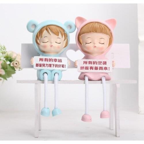 Creative cartoon boys and girls resin hanging feet doll ornaments holding plates living room TV cabinet decoration
