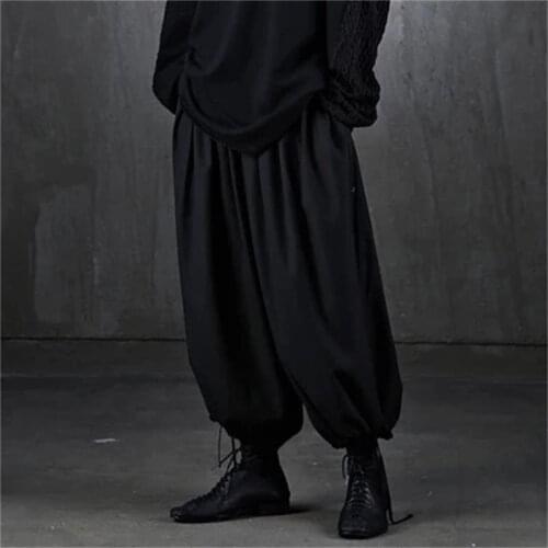 BYTHER mens Korean edition of alternative fashion loose lacing can be bound feet fashion wide leg trousers