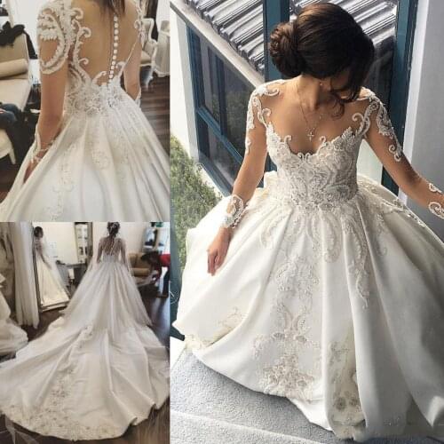 Long Sleeve 2021 Wedding Dresses Lace Applique Crystal Sheer Neck Bridal Gowns Cathedral Train Satin Plus Size Wedding Dress
