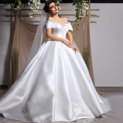 Serene Hill White Satin Beaded Pearls Wedding Dress 2021 Sexy Off Shoulder High-end Lace Up Bridal Gown CHM67240
