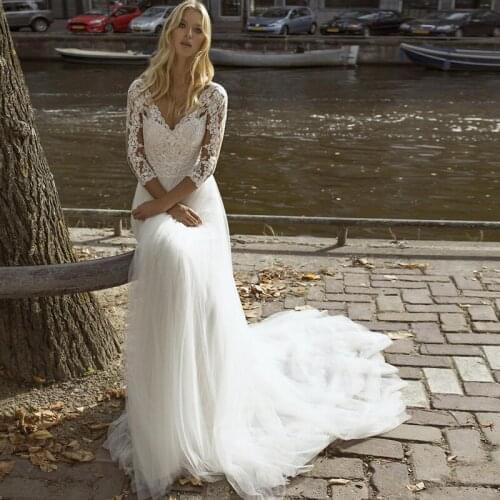 Amazing A line Long Sleeve Tulle Wedding Dress V Neck Open Back Bridal Gowns Islamic Dubai Kaftan Saudi Arabic