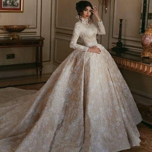 2021 Luxury High Neck Champagne Middle East Wedding Dresses White Lace Appliqued Long Sleeves Arabic Bridal Gowns Court Train