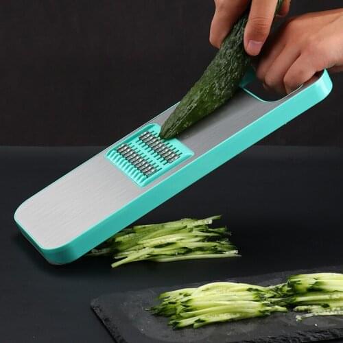 The home use multi-purpose kitchen cuts the vegetable magical instrument stainless steel to dig the silk slicer