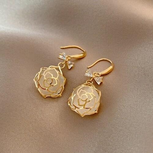 Golden hollow rose earrings elegant retro bow simple opal personality womens bohemian pendant gift jewelry