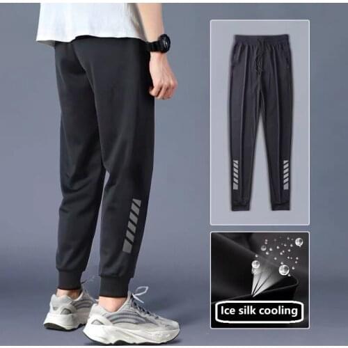 Ice Silk Breathable Casual Pants Mens 2021 Summer Loose Air-conditioning Pants Plus Size Nine-point Stretch Sports Pants