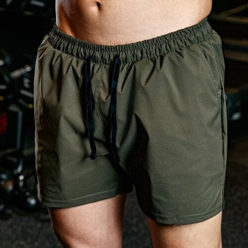 2021short summer new beach shorts mens solid color sports casual shorts mens quick-drying fitness sports running surf shorts