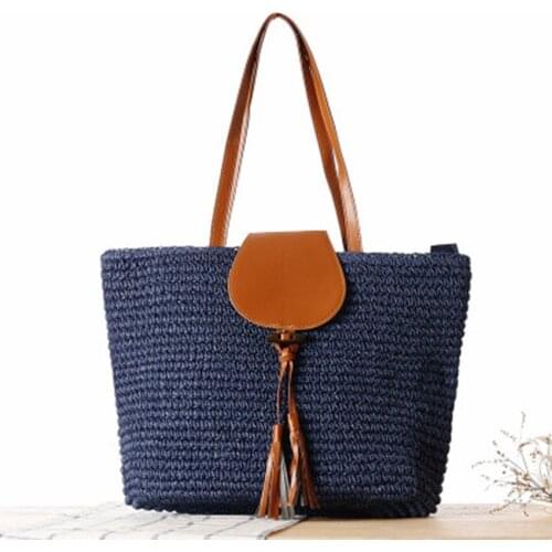 The new straw bag covered womens shoulder knit bag England travel vacation beach leisure bag