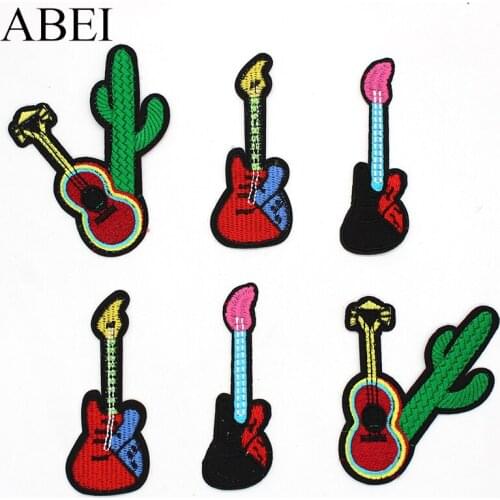 10pcs/lot Embroidered guitar Patches Iron-on Cartoon Music equipment Appliqued Stickers DIY Patchwork Sewing Apparel Accessory