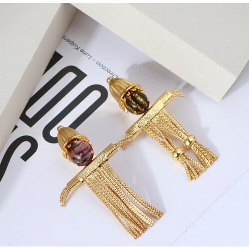 European and American minority design Scarecrow shape lovely wind Brooch Gold advanced sense tassel pin temperament Gift Girl