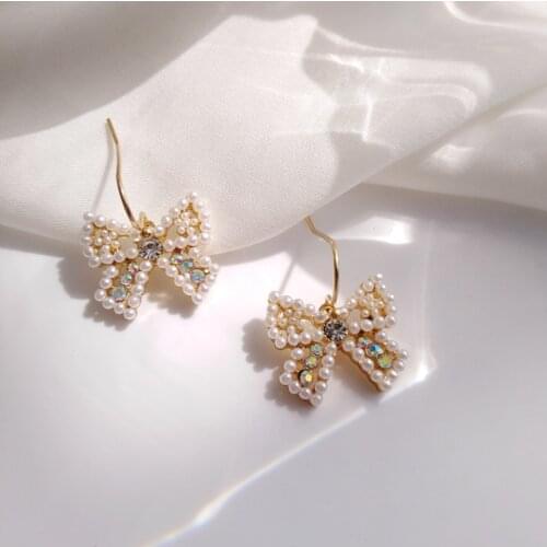 Wholesale Girls Bow Pearl Earrings Beautiful Hollow Luxury Crystal Ear Pendant Women Wholesale