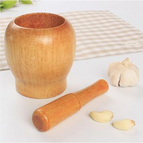 Wood pestle and mortar mixing bowls polished