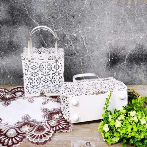 Retro rustic metal handbag flower arrangement