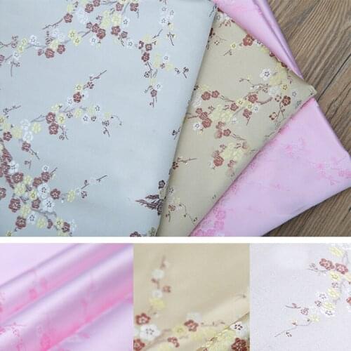 High quality brocade jacquard chemical fiber plum blossom pattern fabric for felt patchwork sewing DIY women dress by 100x90cm