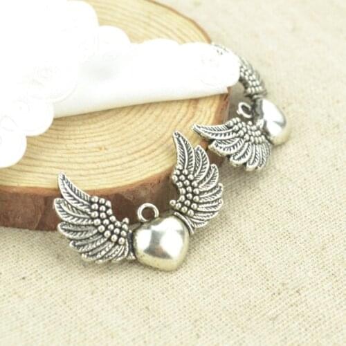 High quality 7pcs metal antique silver Plated wing charms for DIY jewelry making 35*27mm 2491