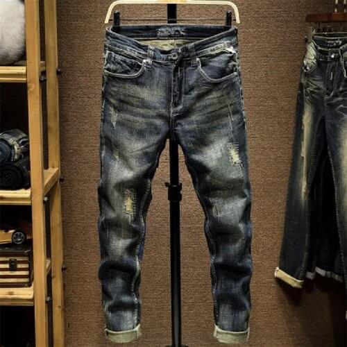New broken hole jeans men European and american States small footprints slim jeans Fashion trend holes subsidize casual jeans