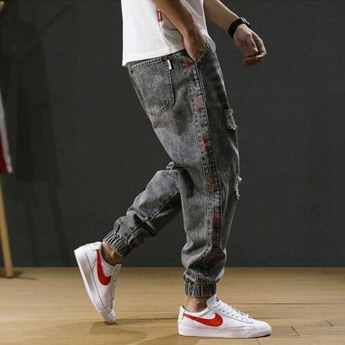 2021 New Fashion Men Jeans Stripe Designer Loose Fit Destroyed Ripped Harem Jeans Men Cargo Pants Streetwear Hip Hop Jeans