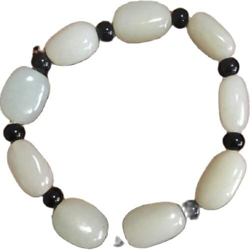 Natural seeds of Xinjiang Hetian jade seed Carved beads Jade hand string A