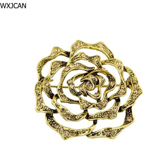 WXJCAN round shape carved hollow flower brooch pin Vintage yellow metal inlay rhinestone brooch pins and brooches women B5154