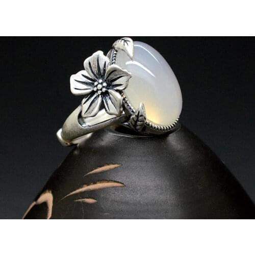 New silver original design plum blossom inlaid with natural white jade pith female Chinese style light luxury cool breeze ring