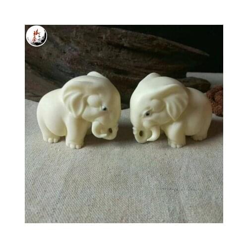 Natural ivory fruit hand carved auspicious elephants hanging table to attract wealth sculpture statue home decoration wedding
