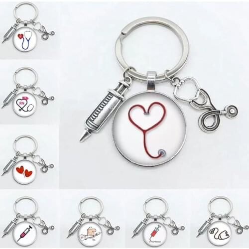 Creative Doctor Injection Stethoscope Picture Keychain Round Dome Pendant Men And Women Fashion Stethoscope Syringe Alloy Key Ri