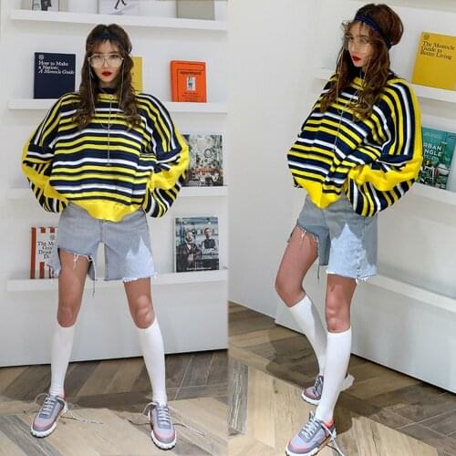 Net red Korean contracted large size autumn and winter reducing age round collar stripe lazy wind loose stripe sweater
