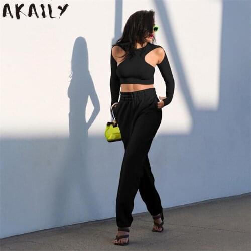 Akaily Autumn Streetwear Solid Casual 2 Two Piece Sets Womens Fitness Outfits White Hollow Out Crop Top Loose Long Pants Sets