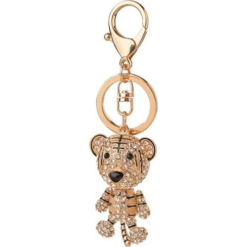 Creative keychain small gift three-dimensional three-dimensional tiger alloy keychain girl school bag decoration car pendant
