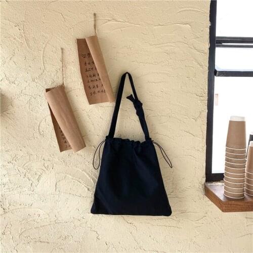 2020 new ins bag female bag student shoulder bag simple and versatile college style fashion pumping bucket canvas bag trend