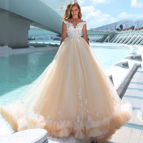UZN Champagne Wedding Dress A-Line Scoop Neckline Lace Appliques Cap Appliques Sleeves Tulle Bridal Gowns Brides Dress