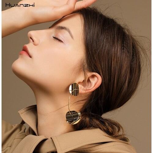 HUANZHI 2019 Metal Fashion Sequins Gold Disc Arc Earrings Exaggeration Long Irregular Stud Earrings for Women Girl Gifts