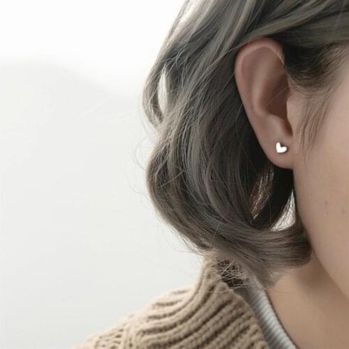 Korean version of Ins mini minimalist titanium steel earrings anti - allergic peach heart ear nails heart earrings