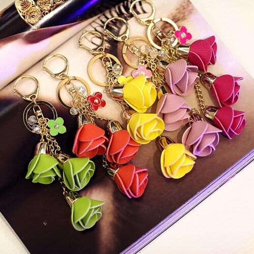 Creative camellia leather tassel key chain car hanging bag pendant PU tassel