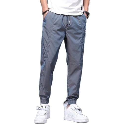 Men Casual Pants 2021 new ice silk fluorescent pants Fashion Slim Man Casual Trousers Korean Male Encil Pants Trendy Size 28-38