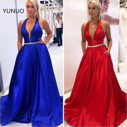 YUNUO Long Prom Dresses A-Line 2021 Halter Neck Sexy Party Dress Maxi Prom Evening Gowns with Pockets Satin Crystals Sashes
