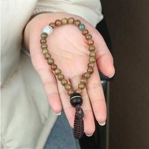 Small leaf red sandalwood car keychain lucky high-end hand-woven lanyard creative evil spirit key chain