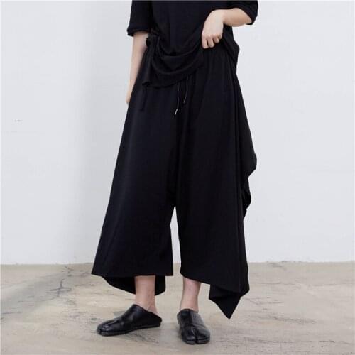 Spring and Autumn womens new pure black series wide leg trousers irregular large pocket design low-grade skirt tight waist