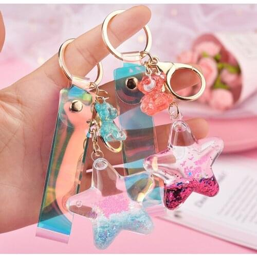 Creative trend acrylic five pointed star Keychain oil injection flow Sequin quicksand bag accessories