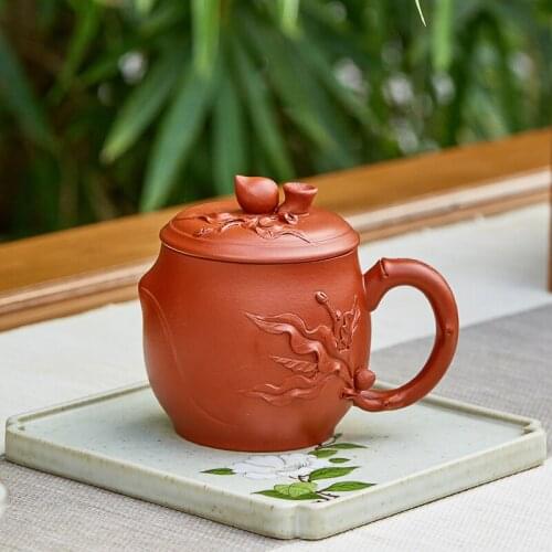 Yixing purple sand cup by pure manual undressed ore zhu mud purple sand tea cup cover cup peach office glass cup