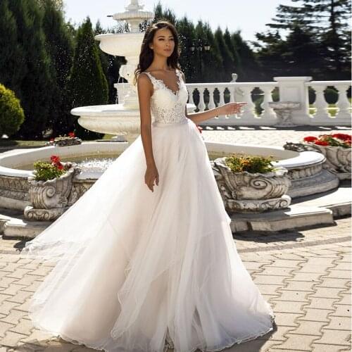 New Arrival V Neck Beach Wedding Dresses 2021 A Line Ruffles Tulle Floor Length Bohemian Bridal Gown