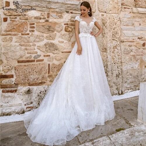 Boho Wedding Dress 2020 Lace Beaded Crystal Beach Bride Dresses Cap Sleeve Backless Bohemian Bridal Gowns Vestido De Noiva