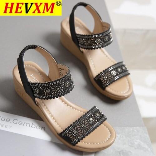 2021 Woman Shoes The New Solid Color Casual Shoes Summer Wedge Sandals Woman Hollow Flower Design Platform Platform Shoes